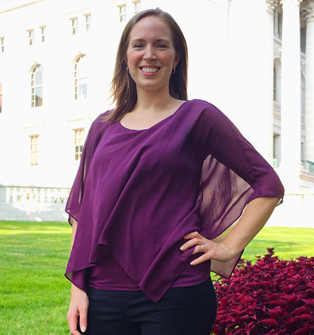 Dr. Britta standing outside of the State Capitol in Madison, Wisconsin