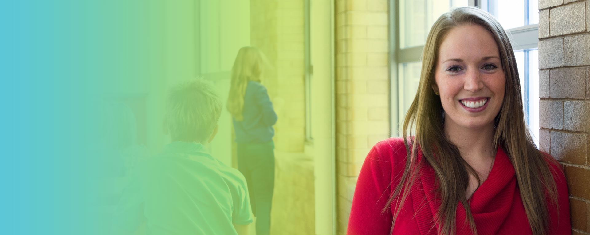 Dr. Britta Bresina in classroom with students